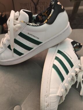 adidas Superstar Sneakers in White with Green Stripes